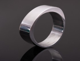 Lina Christensen: A wide 'Extra' bangle of sterling silver, dess. 422E.