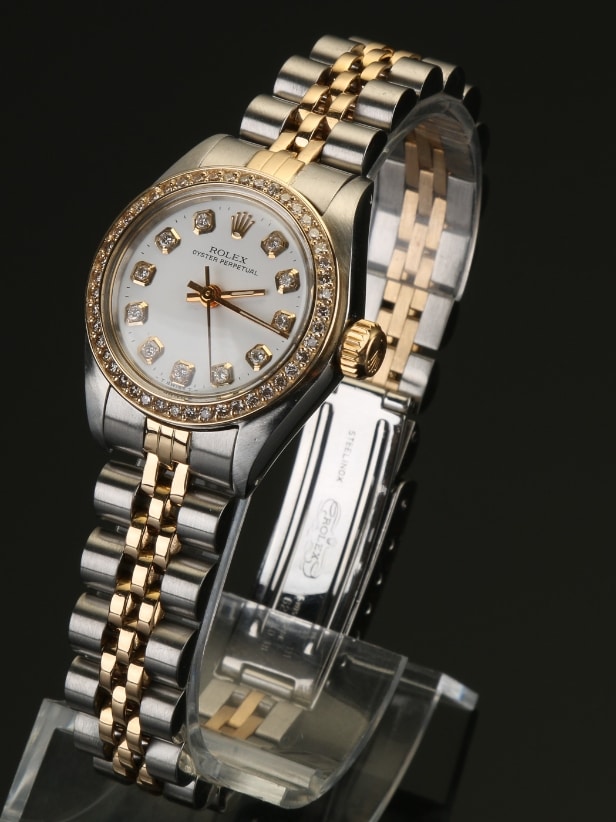 Rolex dameur i 18 karat guld/stål med Diamanter