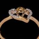 Diamonds by Frisenholm. Heart ring of 9 kt gold