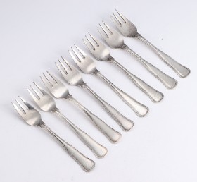 Carl M. Cohr, 'Double fluted', silver cake forks (8)