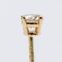 A natural brilliant earring made of 14 kt gold 0.16 ct