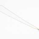 An opal and diamond pendant of 18k gold and a necklace of gold-plated sterling silver. (2)