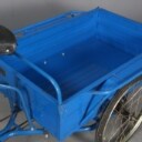 Budcykel med lad.