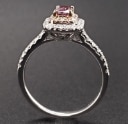 Diamond ring with red violet diamond of 14 kt. white gold, total approx. 0.58 ct.