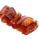 An amber bracelet on elastic. Weight 102.5 g.