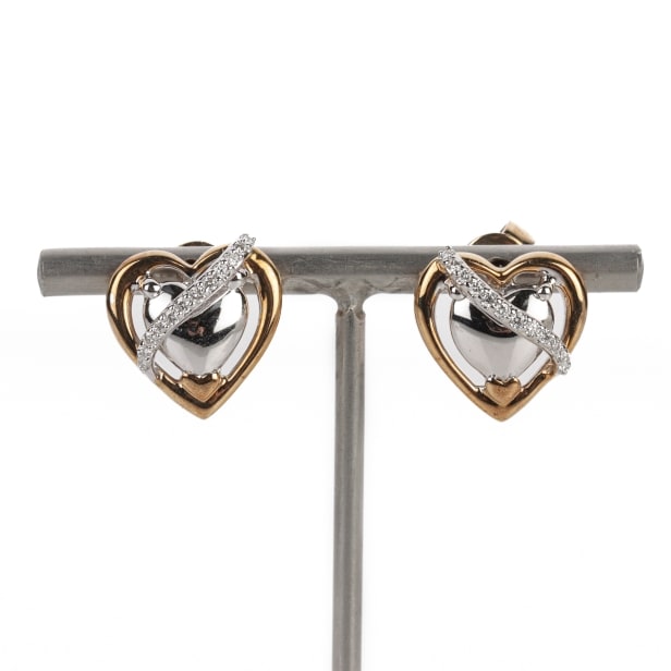 Diamonds by Frisenholm. A pair of diamond earrings of 9 kt. rose gold and white gold