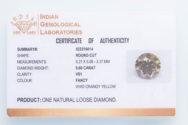 Uindfattet brillant slebet diamant på  0.60 ct