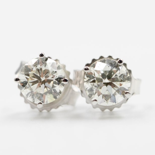 Pair of natural brilliant earrings in 14 kt gold, 1.00 ct. (2)