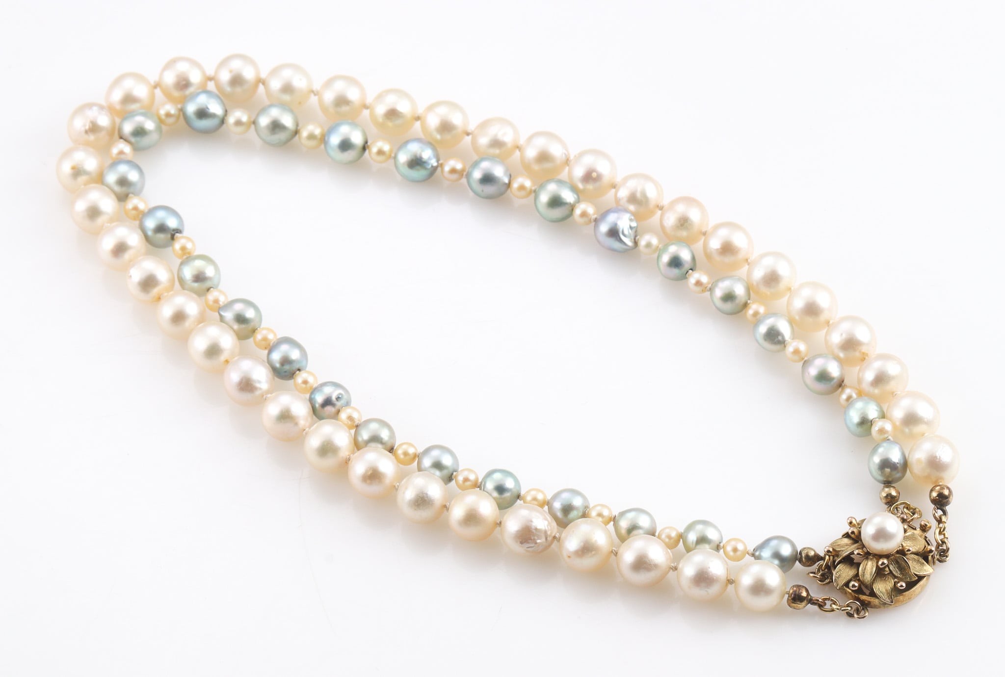 Double-strand pearl necklace with 14 kt. gold clasp