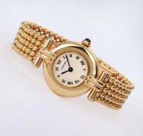 Cartier 'Colisee'. Dameur i 18 kt. guld med lys skive, ca. 1990'erne