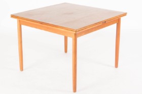 Danish furniture manufacturer. Teak dining table with Dutch extension