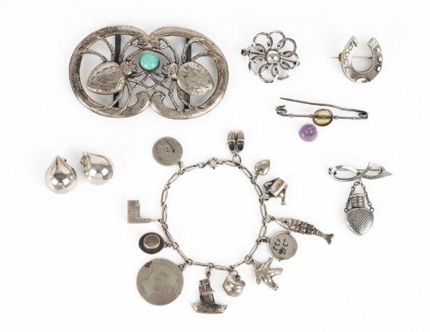 Hans Hansen a.o.: A jewellery collection of silver. (8)