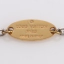 Louis Vuitton. Two-tone metal bracelet with logo pendant
