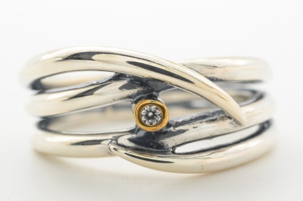 Ring med brillant på ca. 0.02 ct. Sterling sølv, str. 50