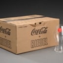 Et sæt på 12 Riedel Coca-Cola glas i original emballage.
