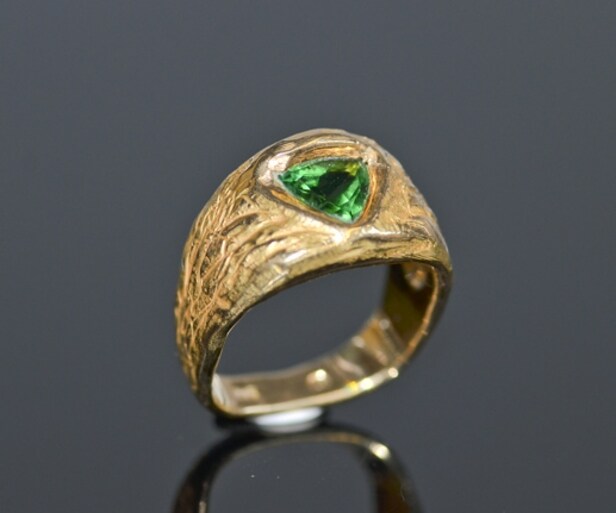 Designerring med en Paraiba-turmalin, ca. 1.40 ct., udført af 18 kt. guld, med et certifikat og smykkepas