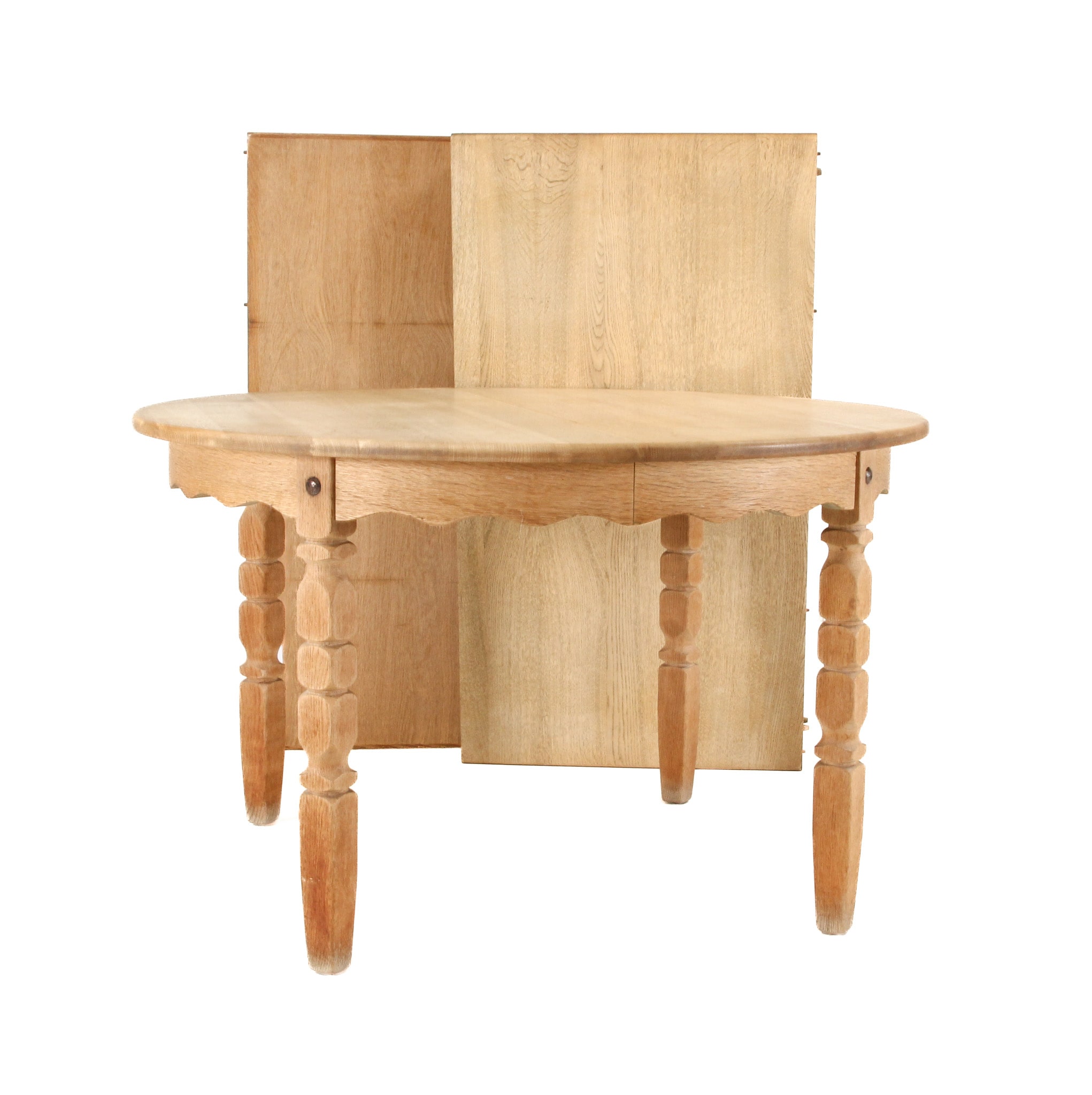 Danish furniture manufacturer. Circular dining table, solid oak