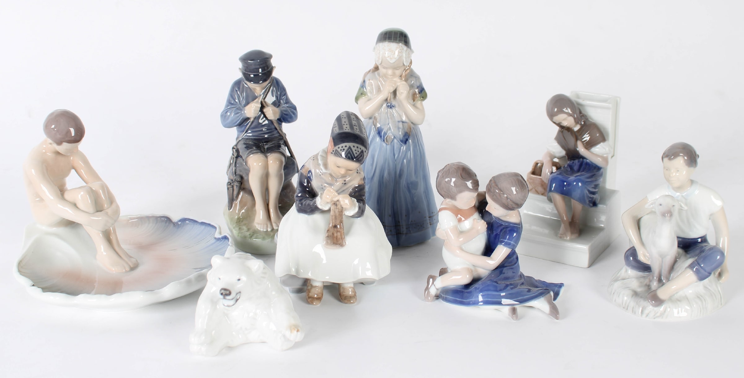 Royal Copenhagen / Bing & Grondahl. Collection of figurines (8).