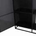 Display cabinet in black painted perforated metal.