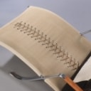 Preben Fabricius & Jørgen Kastholm. 'Græshoppen', chaiselongue i sort læder, model FK 87