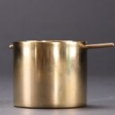 Arne Jacobsen. Stelton vippe askebæger af messing 