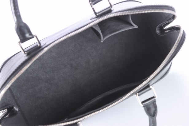 Louis Vuitton: An 'Alma' PM bag of black Epi leather. 2007.