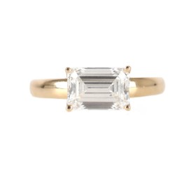 A diamond ring of 14k gold with an emerald cut lab grown diamond, 3.0 ct.