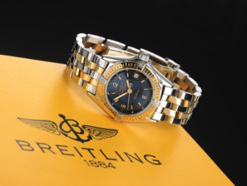 Breitling Callistino. Dameur i 18 kt. guld og stål med blå skive - boks + cert. 1994