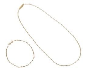 Necklace and bracelet of 18 kt. gold and white gold, 8.9 g. (2)