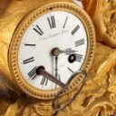 Phillippe H. Mourey. French mantel clock with glass dome, last quarter of the 19th century