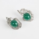 A pair of emerald and diamond ear studs of 14k white gold. 1940s. (2)