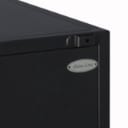 Daneline. Display cabinet in black painted perforated metal.