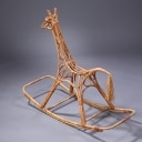Kay Bojesen, attributed. The rocking giraffe made of bamboo, eyes made of beech wood, tail tassel made of bast