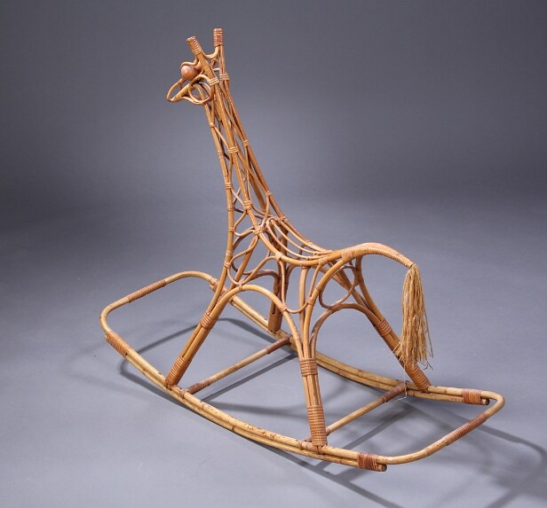 Kay Bojesen, attributed. The rocking giraffe made of bamboo, eyes made of beech wood, tail tassel made of bast