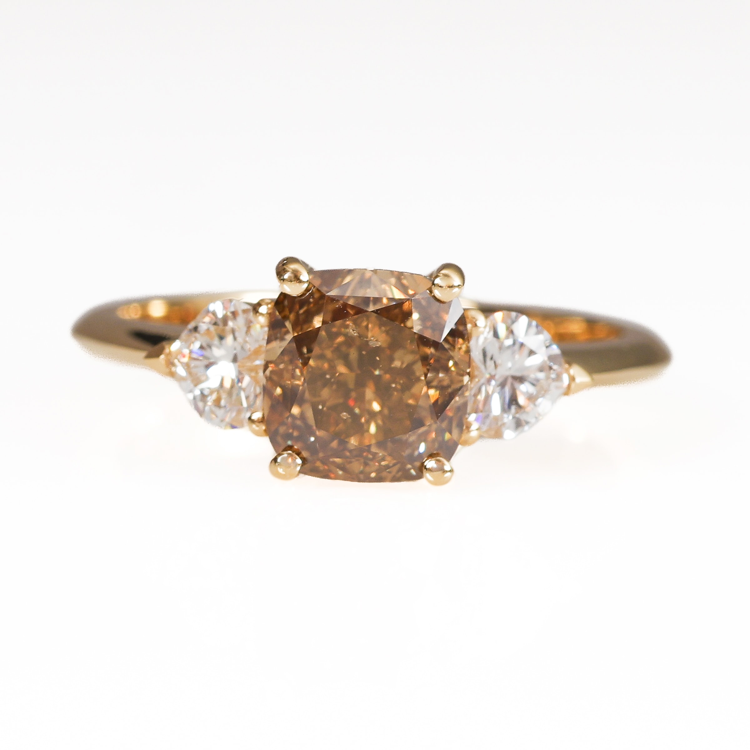 A diamond ring of 18k white gold set with a fancy orangey brown diamond of approx. 2.02 ct. Size 54.