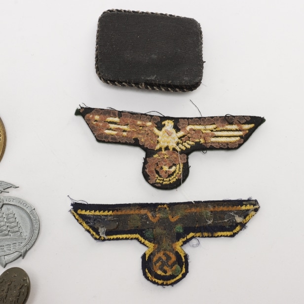 Large collection of German emblems etc. World War II | Lauritz.com