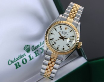 Rolex Date. Dameur i 18 kt. guld og stål med hvid skive - boks + cert. 1984