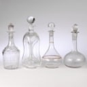 Holmegaard, Bing & Grondahl and others. A collection of porcelain figurines, glass decanters etc. (11)