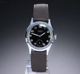 Junghans. Vintage herreur i forkromet metal med sort skive, ca. 1951-55