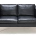 Marstrand from Ilva: Two-seater sofa in black leather.