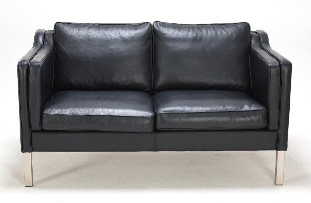 Marstrand from Ilva: Two-seater sofa in black leather.