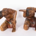 Pair of carved Balinese wooden figures (2)