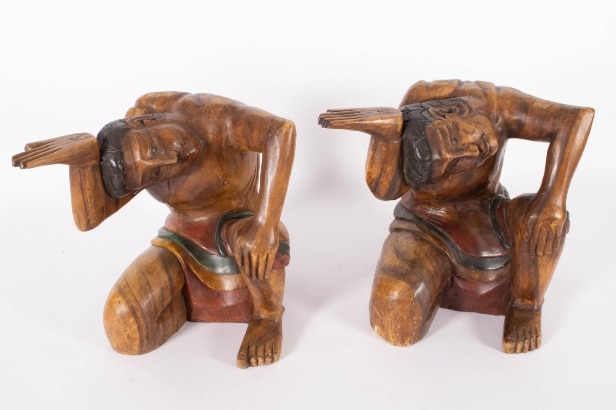 Pair of carved Balinese wooden figures (2)