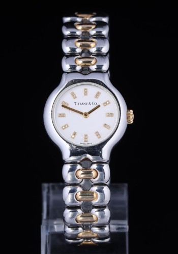 Tiffany & Co. Damearmbåndsur af 18 kt guld og stål med diamanter, model Tesoro, 1990erne