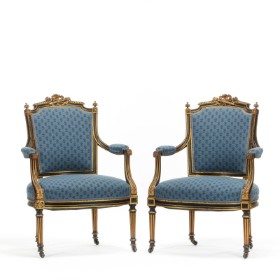 A pair of armchairs in the Louis XVI style, black painted and gilt wood frame, approx. 1900 (2)