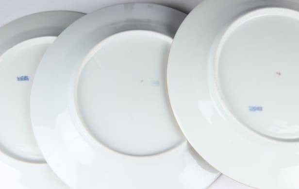 Royal Copenhagen. 'Butterfly' plates and bowl on foot, 19th century (7)
