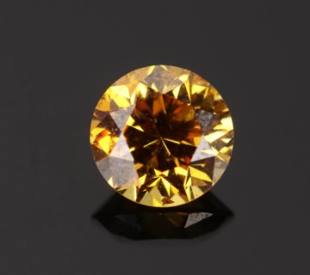 Uindfattet fancy gul-orange diamant 0,39 ct
