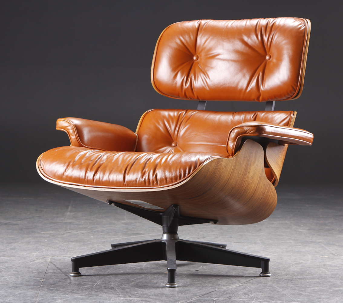 Eames Lounge Chair with accompanying Ottoman, cognac leather, Herman
