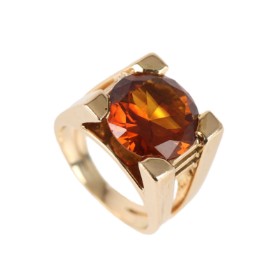 Jørgen Larsen: A ring of 14k gold with a synthetic orange sapphire. 1970s.