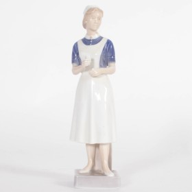 Royal Copenhagen: Nurse, porcelain figure no. 4507 2 black.